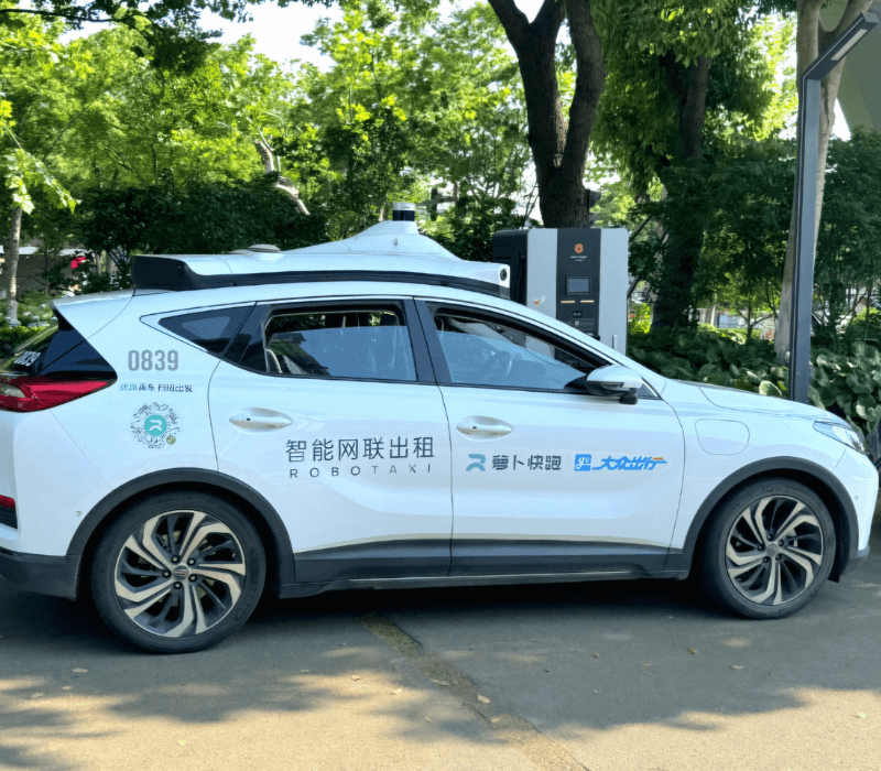White autonomous robotaxi experience